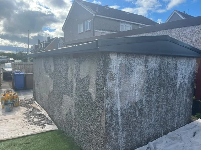 Exterior Before Refinishing by DL Plastering & Roofing